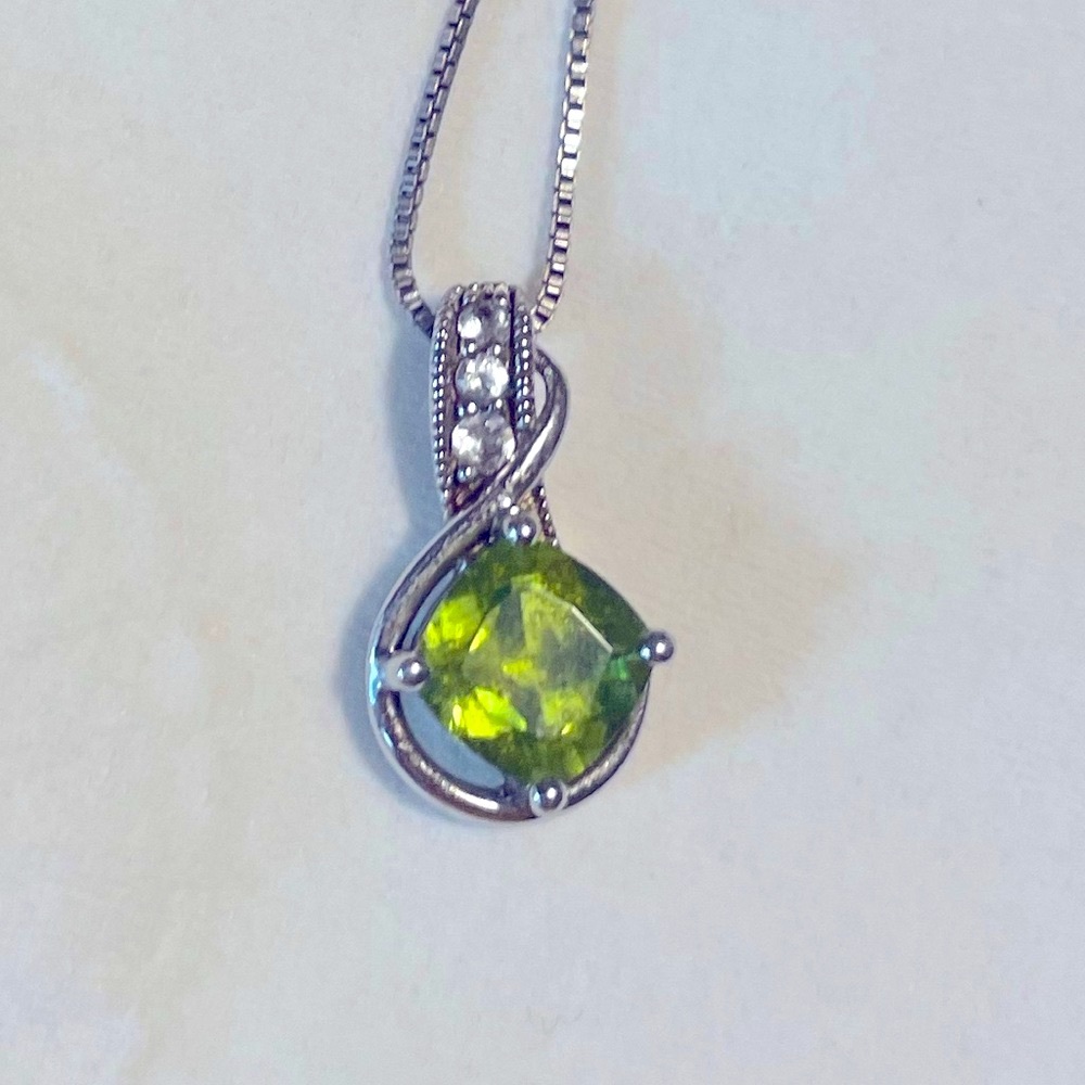 Kay’s peridot necklace, sterling silver, white topaz accents